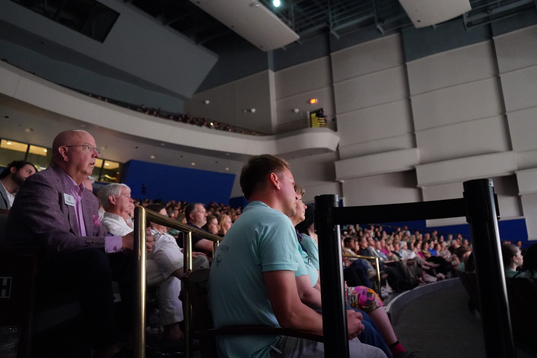 people sitting in a event hall