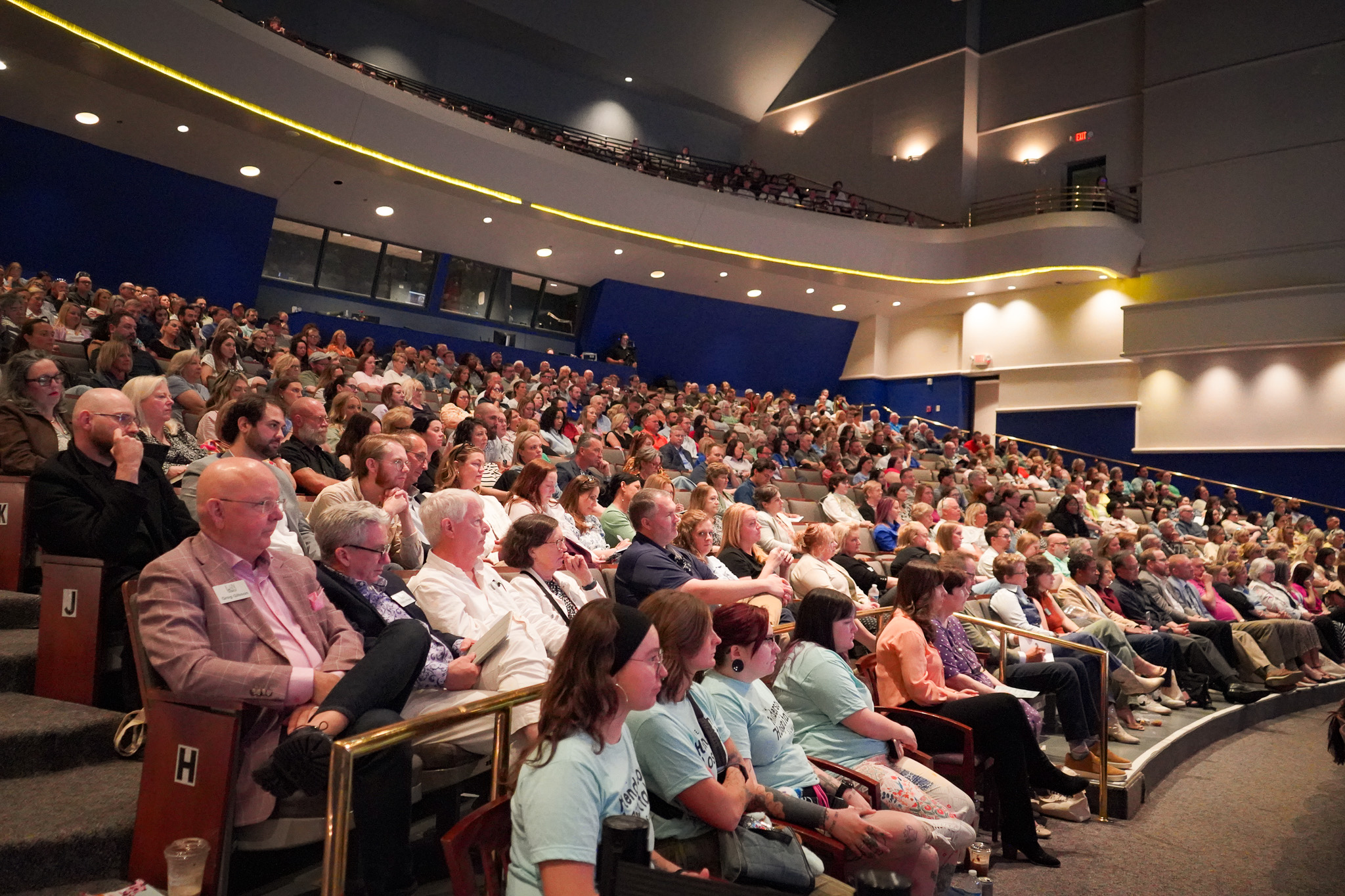 people sitting in an event hall